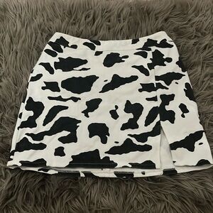 LELIS cow print jean skirt in a size small never worn